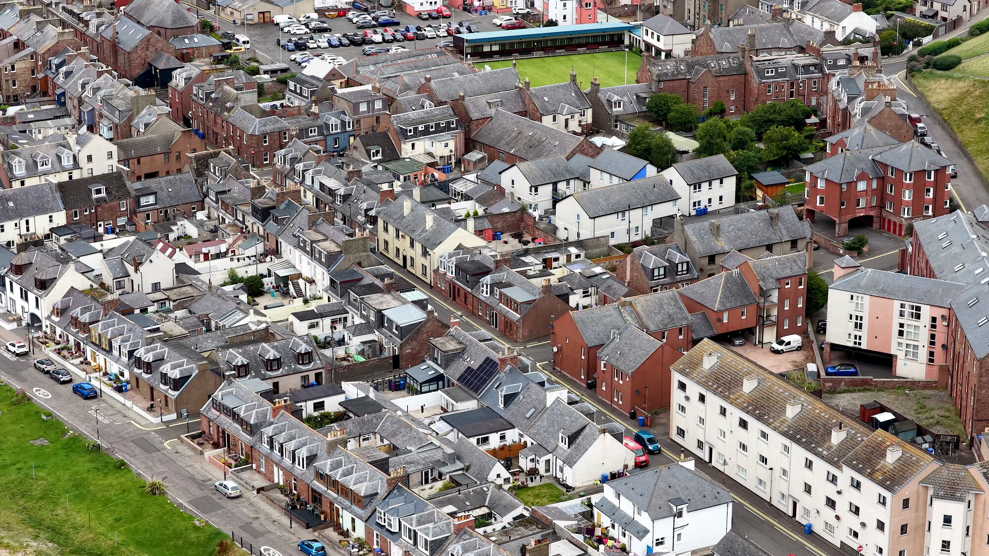 Aerial view of terraced streets and flats in a Scottish town (stock photo)